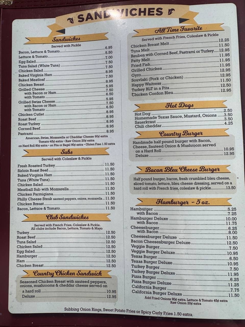 Menu page listing baskets, clubs, and hot sandwiches.